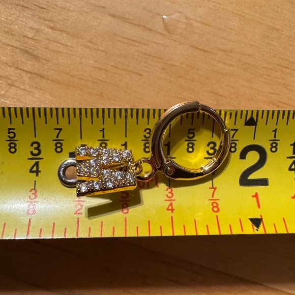 Gold Tone Huggie Rhinestone M Earrings - Picture 4 of 5